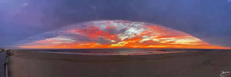 Eyebrow Cloud Over the Beach