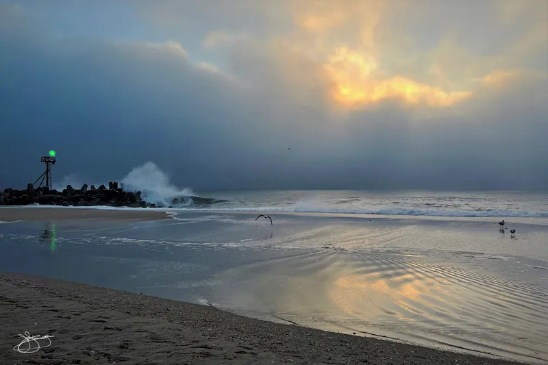 Still Water and Crashing Waves on the Beach