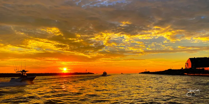 Fall Sunrise as the Boats Head out of the inlet